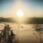 a sunset over a body of water