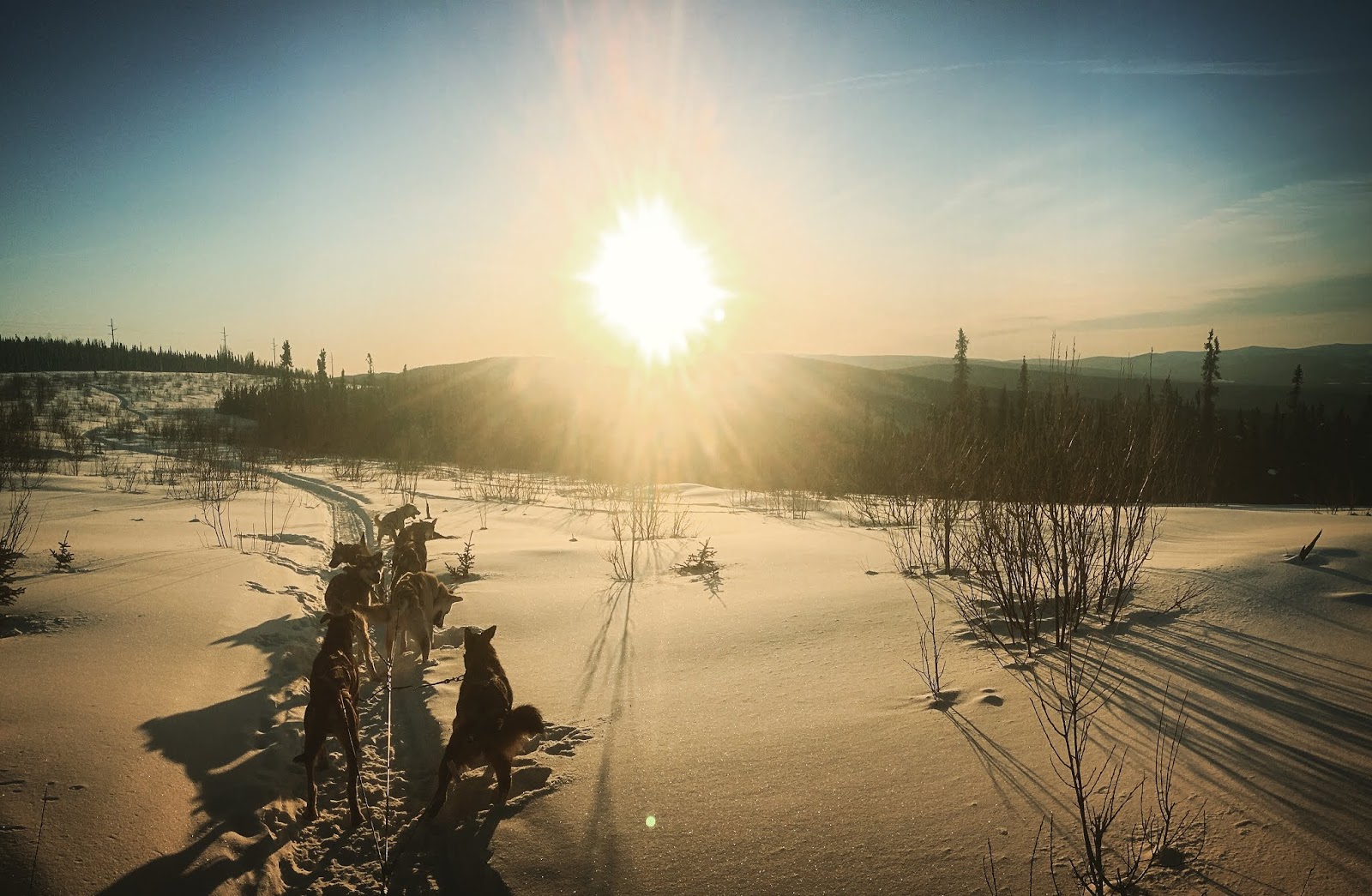a sunset over a body of water