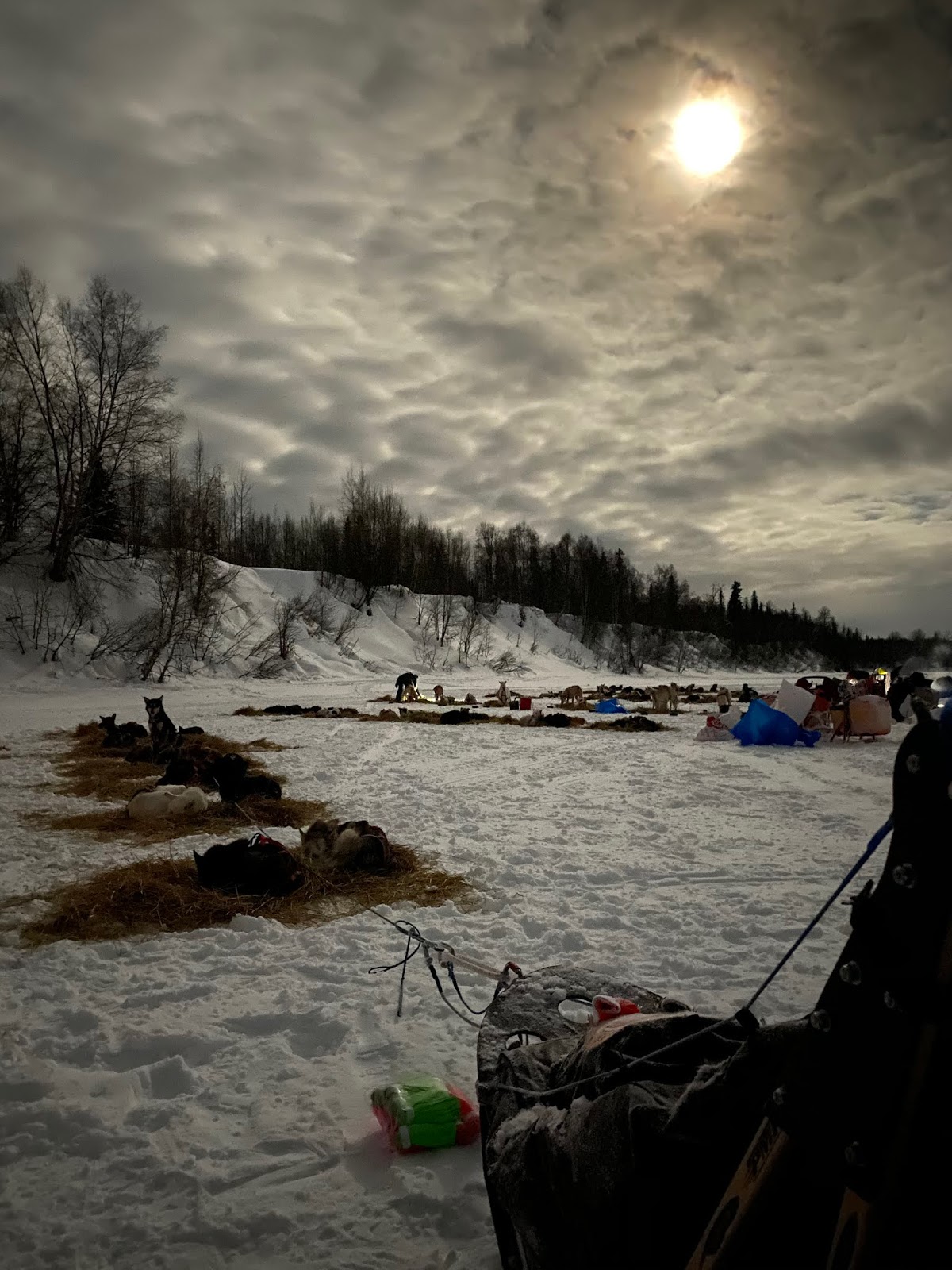 a group of people in a boat on a body of water
