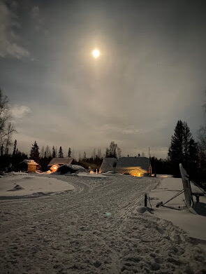 a sunset over the snow